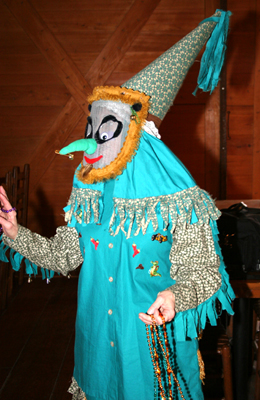 Colorful Cajun Mardi Gras screen mask and costume.